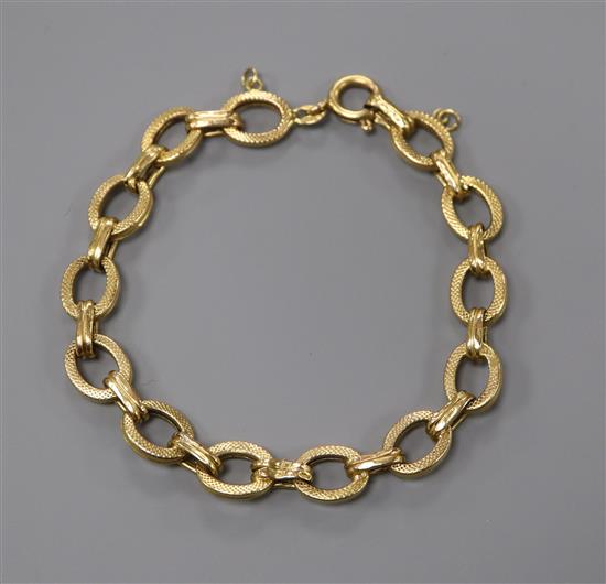 An Italian textured 750 yellow metal bracelet, 20.8cm.